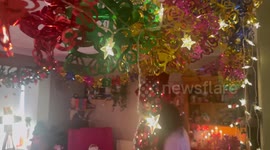 Woman goes all out to embrace 2025 'tacky Christmas' decor trend - with dusty foils and garish decs