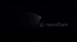 Mysterious cone-shaped light spotted in night sky over northern Thailand