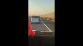 Foreigner leaves van to dance on highway during traffic jam
