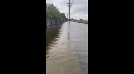 Coastal flooding and rain‑soaked streets in East Islip, New York, USA