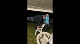 Man trips while attempting a jump over a plastic chair in Voiron, France