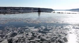 DRONE - Rondout Lighthouse surrounded by ice in Kingston