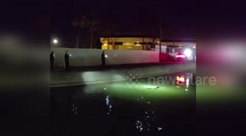US: Police And Firefighters Rescue Struggling Dog From Tempe Canal