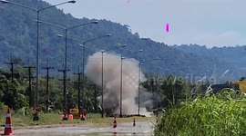 Thai marines destroy explosive artillery shell from Cambodia on road