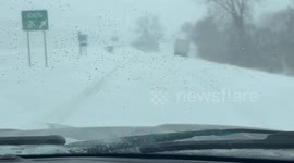 Lake-effect snow blankets roads in Baldwinsville, New York