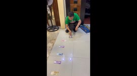 Delighted colleague dances when he wins Christmas party game