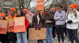 Resident doctors stand on a picket line outside St Thomas’ Hospital in London