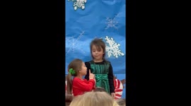 Girl let’s out all her Christmas spirit through song brings out the “Ross” in others.