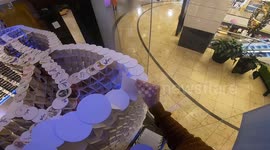 Devastating moment man's structure of 64,000 beer mats collapses in world record attempt