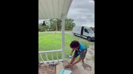 Singing Amazon Delivery Driver Stops To Pet Cat Named Squirrel