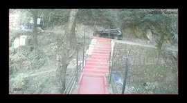 India: A tempo traveller started rolling backward on a hill,