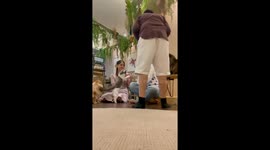 Terrified customer panics as cat startles her at cafe