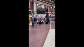 Toddler and grandad turn London station snow globe into Christmas magic
