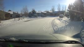 Neighborhood Teen Comically Slides Down Driveway Towards Oncoming Traffic
