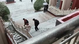 Local slips while cautiously walking down snow-covered steps