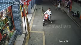 Guilin, China: Man Gets Hit by Falling Ladder - The Purr-petrator is a Cat!