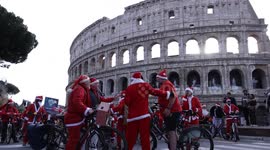Santa-clad cyclists join charity ride for children in Rome
