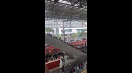 Escalator pile-up leaves 13 injured at train station in Brazil