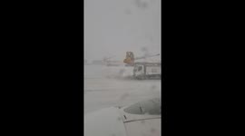 Heavy snowfall disrupts Calgary airport in Alberta, Canada