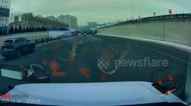 Car loses control on icy tunnel road in Heilongjiang, China