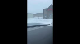 Heavy snowfall paralyzes streets and local businesses in Winnipeg, Canada