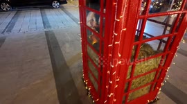 A nativity scene located in a rather unusual location an old fashioned Red Telephone box located in Mayfair