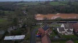 Drone reveals true size of massive sinkhole along canal