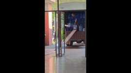 Loader strategically unloads water buckets in Guangxi, China