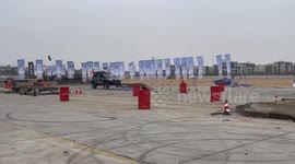Off-road car flips after hitting ramp during city racing event in Hubei, China