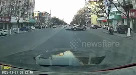 Dashcam captures SUV and bicycle collision in Hebei, China