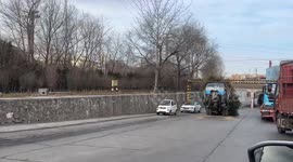 Overloaded tricycle lifts off while climbing uphill in Shanxi, China