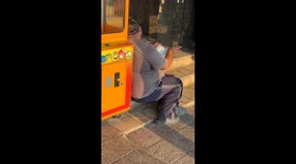 Singing Man Disturbs Sleeping Dog