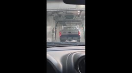 Truck Breaks Car Wash