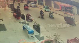 Helpful e-bike rider topples over moments after assisting woman