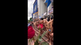 Men hold naked protest at university over social issues (contains nudity).