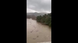 Hérault River bursts banks, flooding fields and roads in Brissac, France