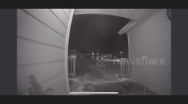 Husband Carries Wife Across Icy Sidewalk