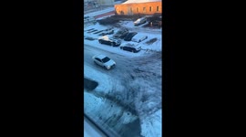 Denver Drivers Struggle on Icy Hill
