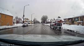 Impatient Chicago Driver Crashes Onto Snowy Sidewalk After Running Red Light