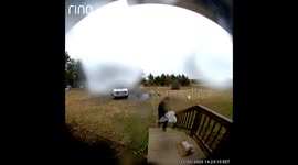 Delivery Driver Protects Competitors Packages From Rain