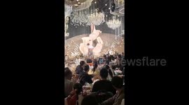 Jaw-Dropping Wedding Performance: The Rotating Fire-Breathing Butt!