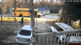 Student trips while boarding school bus in Louisburg, North Carolina, USA