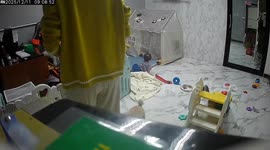 Baby crawls across floor and gets trapped by glass door