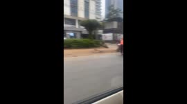Kenyan Man Catches a Ride to Work on Roller Skates