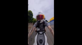 Motorcyclist Takes Gravel Turn Too Fast