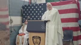 US: Cardinal Dolan Blesses NYPD Officers On Duty Christmas Eve