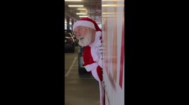 Rolling Santa at the Shopping Mall