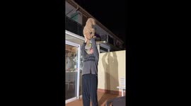 Dad Helps Dog Look Over Fence