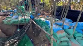 Thai soldiers show Cambodian bunker captured in disputed border territory