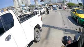 Motorcycle pillion passenger topples backwards when he falls asleep on bike